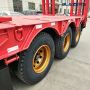 Good Price 70 Tons BLAZERS 3 Axle Low Bed Semi Trailer for Uganda